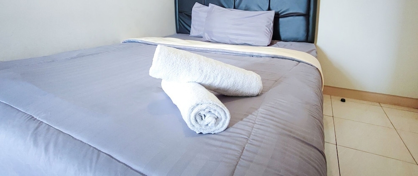 Imagen de la habitación del Hotel Ruang Nyaman at The Springlake Summarecon Bekasi. Foto 6
