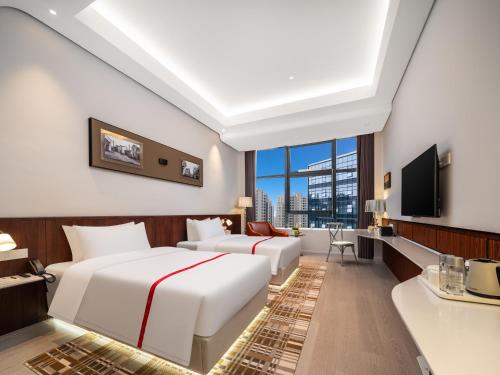 Imagen de la habitación del Hotel Ruby Lacey - Moganshan Deqing. Foto 19