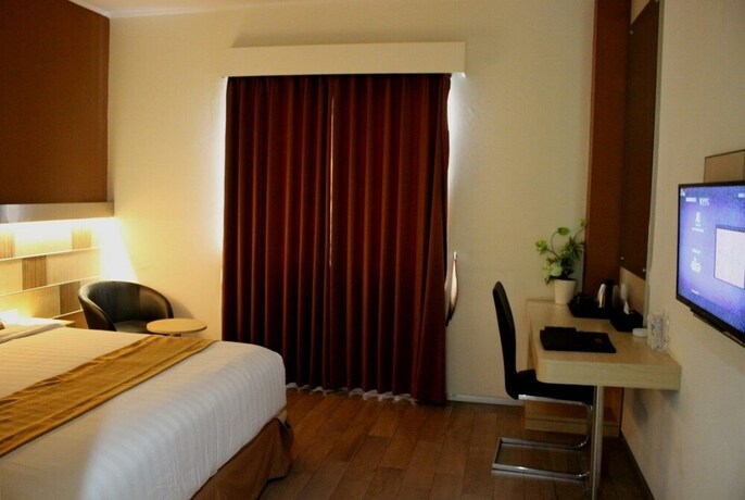 Imagen de la habitación del Hotel Ruby Syariah. Foto 23