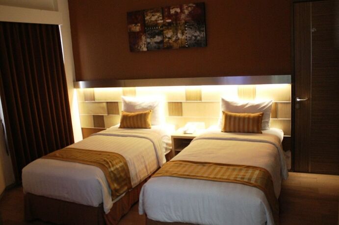 Imagen de la habitación del Hotel Ruby Syariah. Foto 24