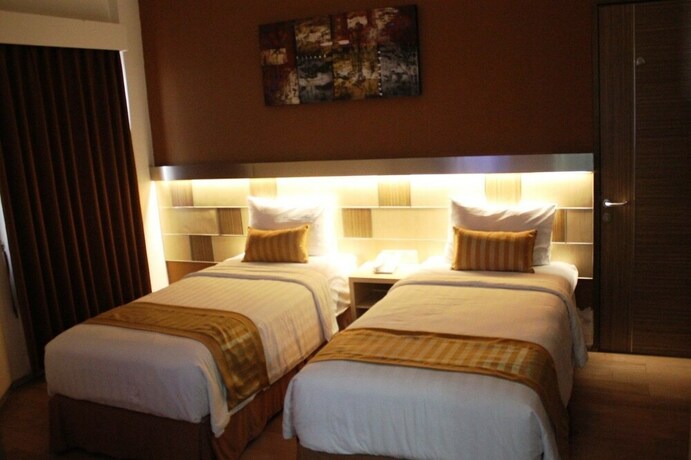 Imagen de la habitación del Hotel Ruby Syariah. Foto 26