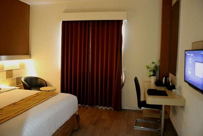 Imagen de la habitación del Hotel Ruby Syariah. Foto 31