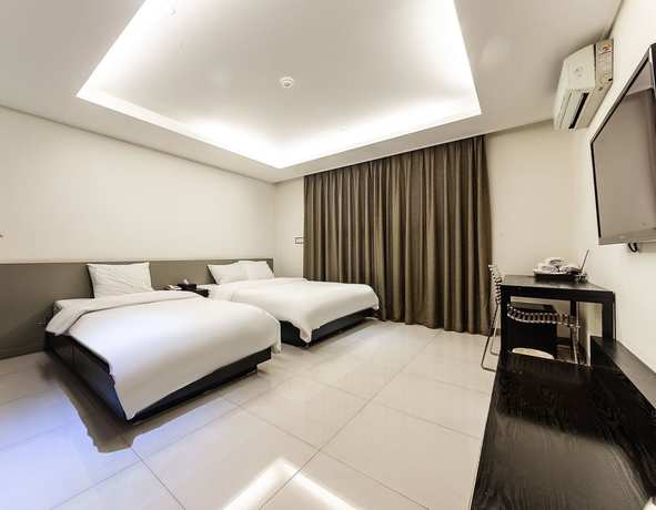 Imagen de la habitación del Hotel Ruby Tourist Wolmido. Foto 8