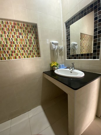 Imagen de la habitación del Hotel Ruckunresort 1. Foto 8