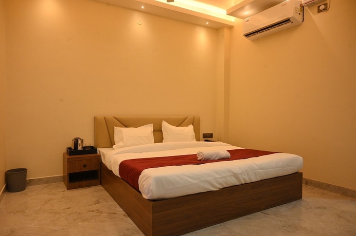 Imagen de la habitación del Hotel Rudra, Guwahati. Foto 1