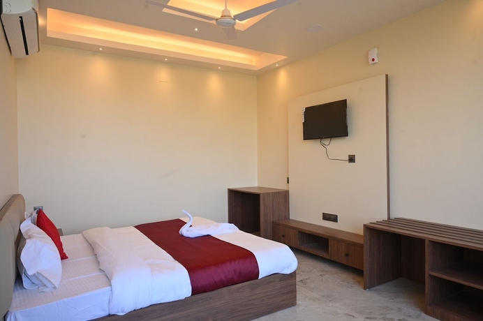 Imagen de la habitación del Hotel Rudra, Guwahati. Foto 2