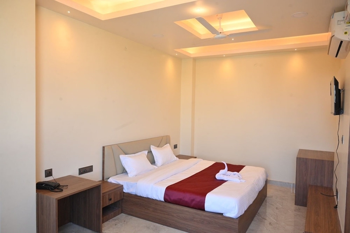 Imagen de la habitación del Hotel Rudra, Guwahati. Foto 5