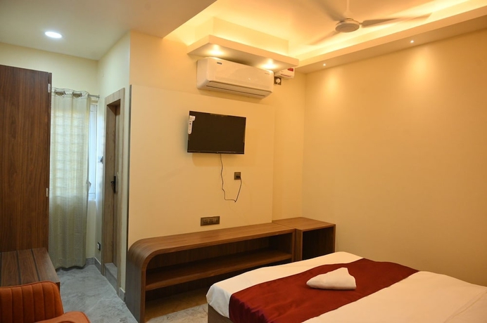 Imagen de la habitación del Hotel Rudra, Guwahati. Foto 13