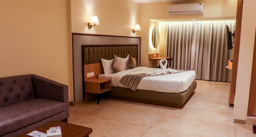 Imagen de la habitación del Hotel Rudra Shelter Business. Foto 16