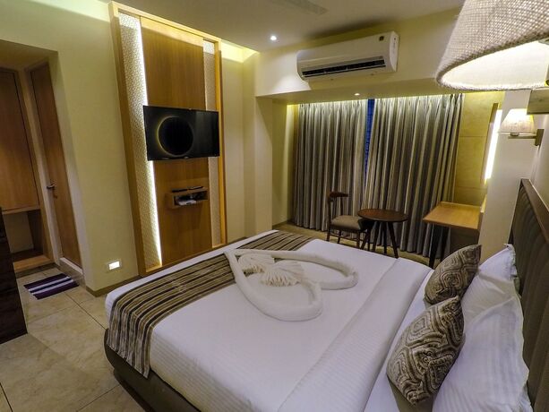 Imagen de la habitación del Hotel Rudra Shelter Business. Foto 18