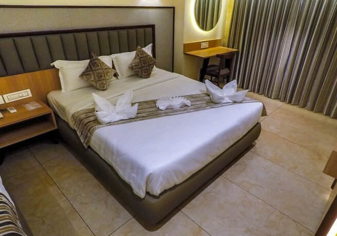 Imagen de la habitación del Hotel Rudra Shelter Business. Foto 19