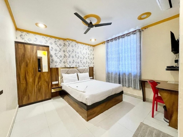 Imagen de la habitación del Hotel Rudra - near Ghats and Temple. Foto 4