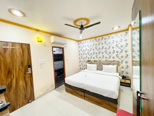 Imagen de la habitación del Hotel Rudra - near Ghats and Temple. Foto 5