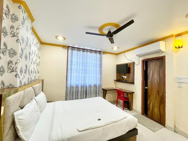 Imagen de la habitación del Hotel Rudra - near Ghats and Temple. Foto 6
