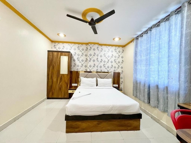 Imagen de la habitación del Hotel Rudra - near Ghats and Temple. Foto 7