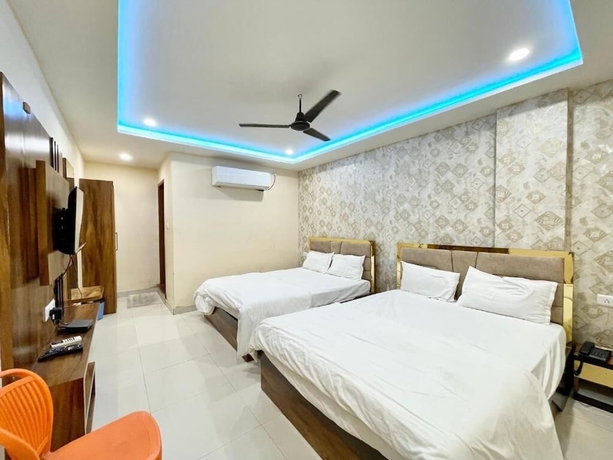 Imagen de la habitación del Hotel Rudra - near Ghats and Temple. Foto 11