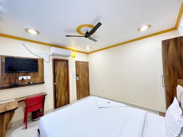 Imagen de la habitación del Hotel Rudra - near Ghats and Temple. Foto 12