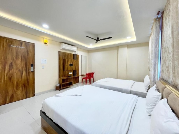 Imagen de la habitación del Hotel Rudra - near Ghats and Temple. Foto 13