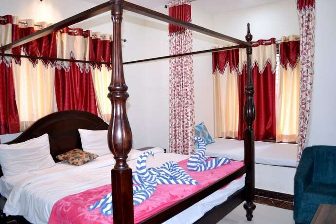 Imagen de la habitación del Hotel Rudraksh And Restaurant. Foto 21