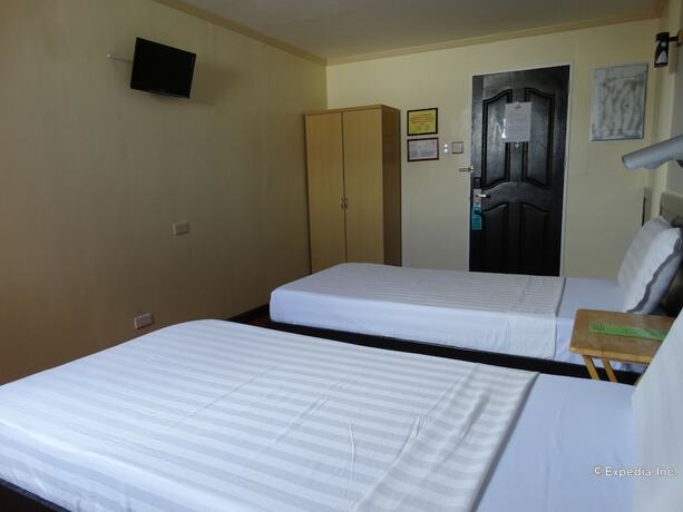 Imagen de la habitación del Hotel RueMango Apartelle and Suites. Foto 13