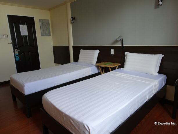 Imagen de la habitación del Hotel RueMango Apartelle and Suites. Foto 20