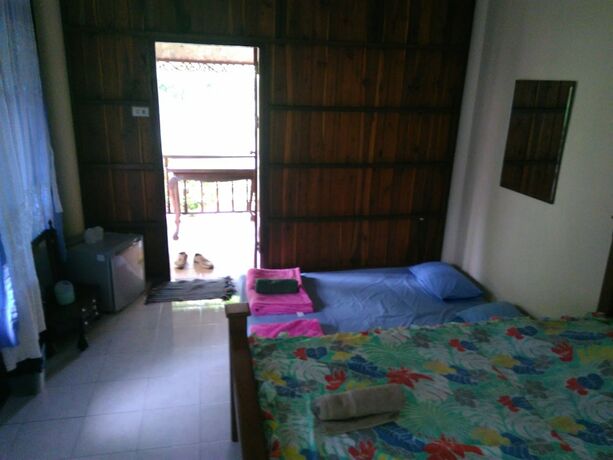 Imagen de la habitación del Hotel Rueanphen Homestay. Foto 18