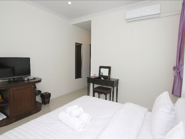 Imagen de la habitación del Hotel Ruen Maihom Riverside Cottage. Foto 5