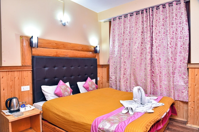 Imagen de la habitación del Hotel Rufina Blue Pine. Foto 2