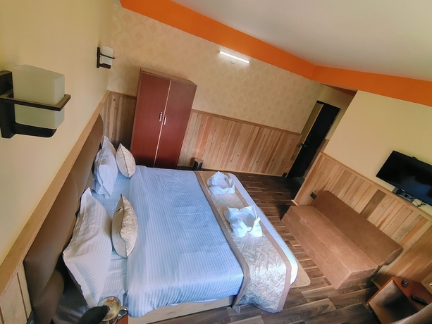 Imagen de la habitación del Hotel Rufina Blue Pine. Foto 10