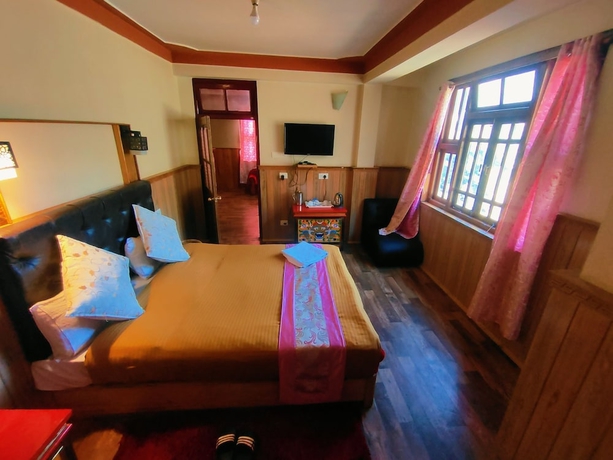 Imagen de la habitación del Hotel Rufina Blue Pine. Foto 11