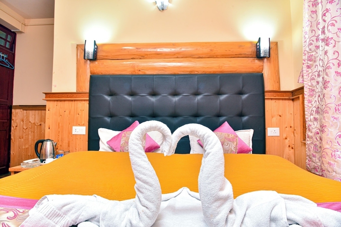 Imagen de la habitación del Hotel Rufina Blue Pine. Foto 15