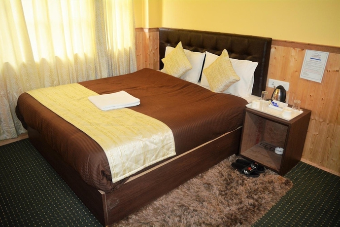 Imagen de la habitación del Hotel Rufina Lachen Deezong. Foto 7