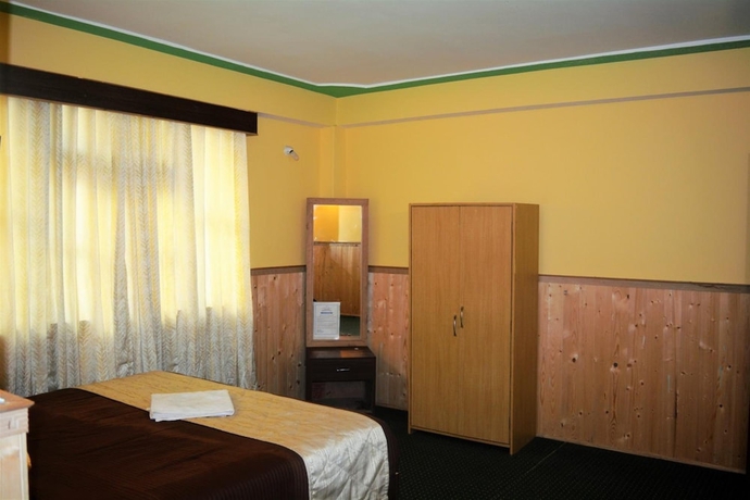 Imagen de la habitación del Hotel Rufina Lachen Deezong. Foto 9