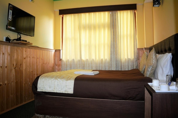 Imagen de la habitación del Hotel Rufina Lachen Deezong. Foto 10