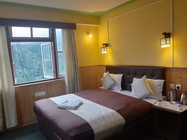 Imagen de la habitación del Hotel Rufina Lachen Deezong. Foto 12