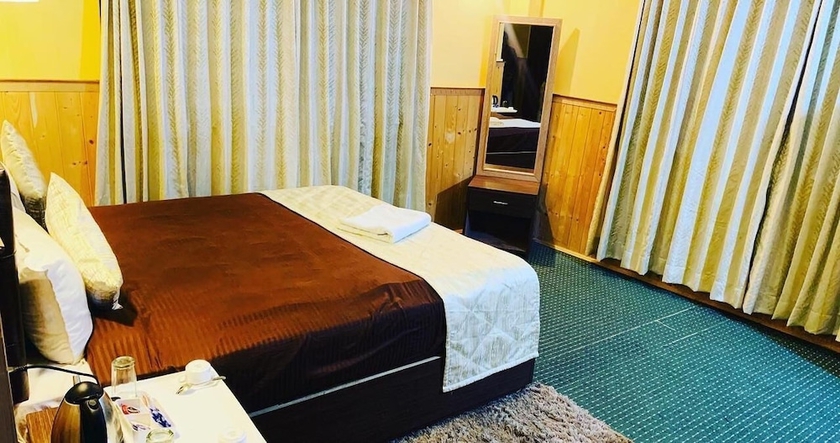 Imagen de la habitación del Hotel Rufina Lachen Deezong. Foto 13