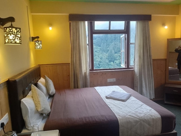 Imagen de la habitación del Hotel Rufina Lachen Deezong. Foto 16