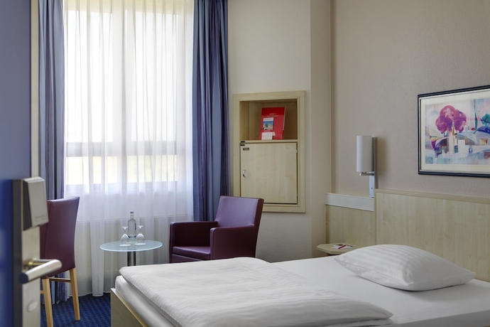 Imagen de la habitación del Hotel Rugs Augsburg City Trademark Collection by Wyndham. Foto 9