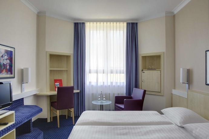 Imagen de la habitación del Hotel Rugs Augsburg City Trademark Collection by Wyndham. Foto 10