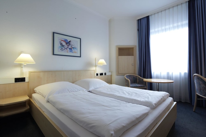 Imagen de la habitación del Hotel Rugs Augsburg City Trademark Collection by Wyndham. Foto 11