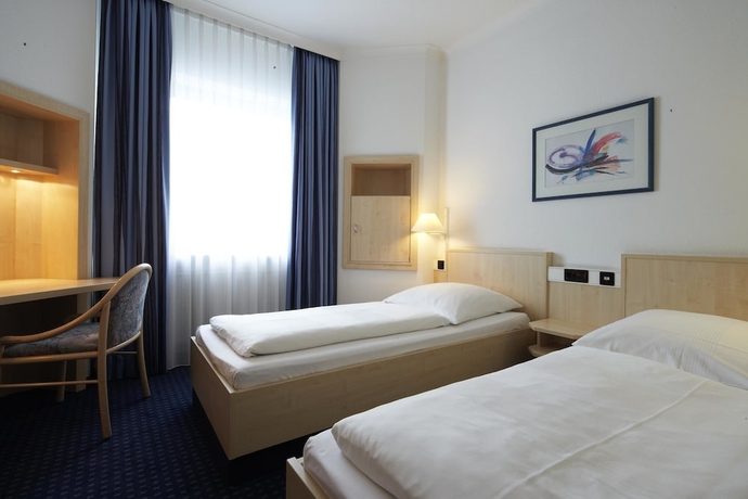 Imagen de la habitación del Hotel Rugs Augsburg City Trademark Collection by Wyndham. Foto 13