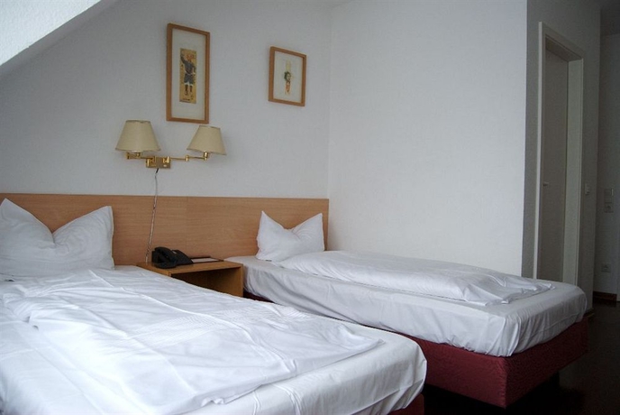 Imagen de la habitación del Hotel Rugs Hotel Düsseldorf. Foto 7