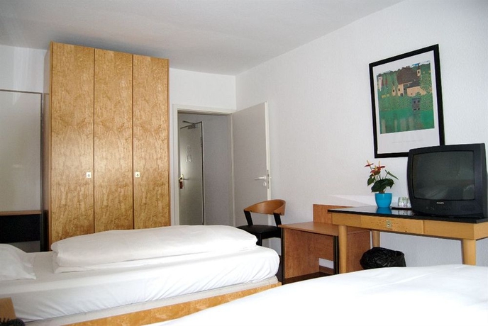 Imagen de la habitación del Hotel Rugs Hotel Düsseldorf. Foto 14