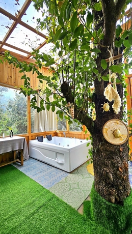 Imagen de la habitación del Hotel Ruhaani Cottages And Cafe. Foto 4