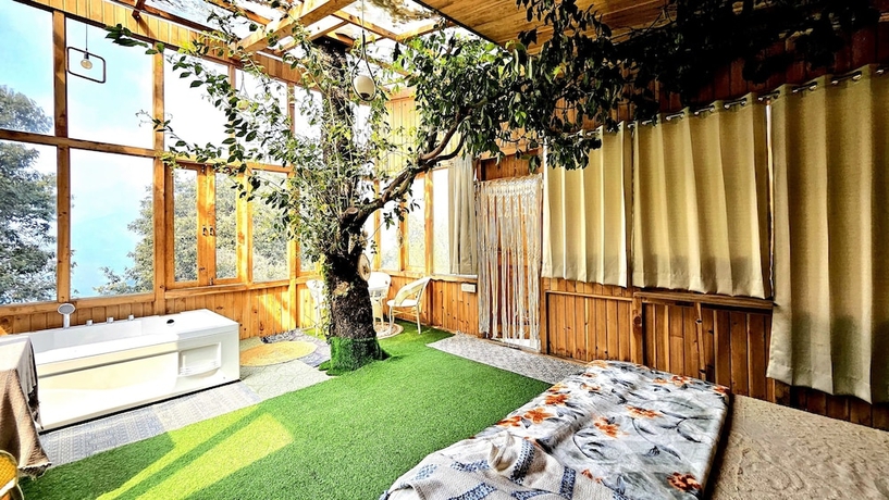 Imagen de la habitación del Hotel Ruhaani Cottages And Cafe. Foto 8