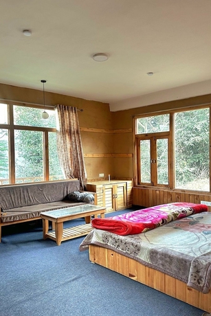 Imagen de la habitación del Hotel Ruhaani Cottages And Cafe. Foto 9