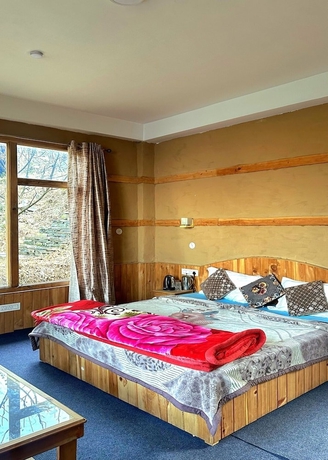 Imagen de la habitación del Hotel Ruhaani Cottages And Cafe. Foto 10