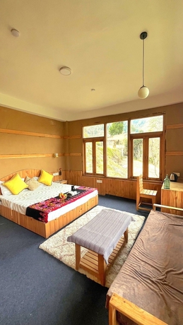 Imagen de la habitación del Hotel Ruhaani Cottages And Cafe. Foto 13