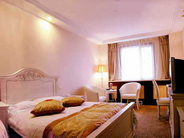 Imagen de la habitación del Hotel Rui Cheng. Foto 3