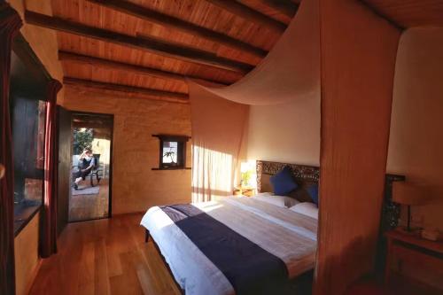 Imagen de la habitación del Hotel Rui Hua Courtyard. Foto 7